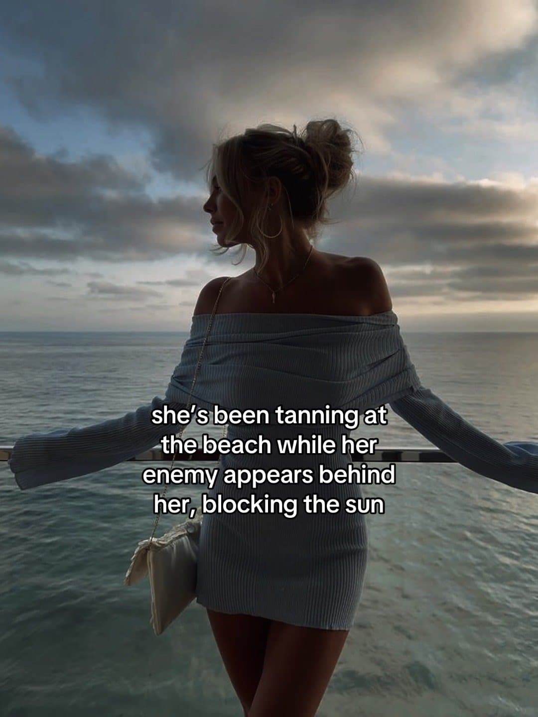 sheβs been tanning at the beach while her enemy appears behind her, blocking theβ¦